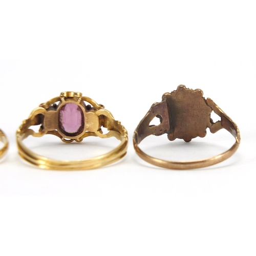 2625 - Three antique rings comprising 18ct gold garnet and seed pearl, unmarked gold opal, ruby and diamond... 