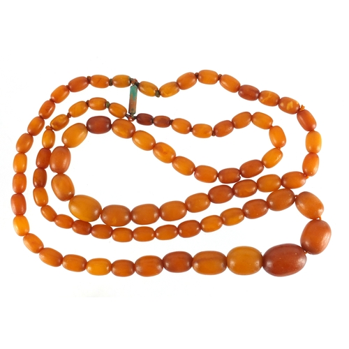 758 - Butterscotch amber coloured bead two row necklace, 40cm in length, approximate weight 32.6g