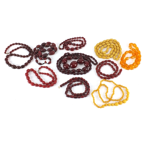 767 - Ten amber coloured bead necklaces, the largest 90cm in length, approximate weight 487.0g