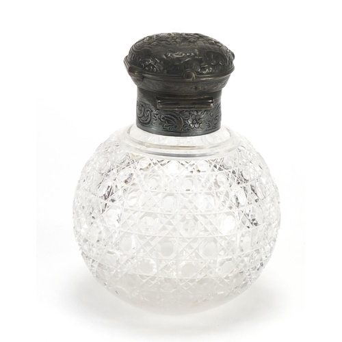 2590 - Victorian globular cut glass scent bottle, the hinged lid embossed with figures and flowers, retaile... 