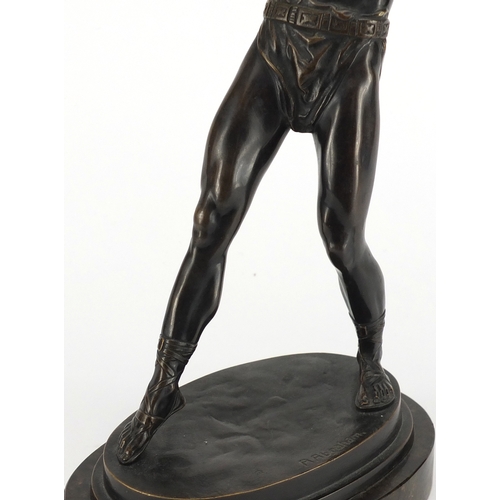 4 - R Abraham - Patinated bronze model of a Grecian Warrior, raised on an oval marble base, 33cm high