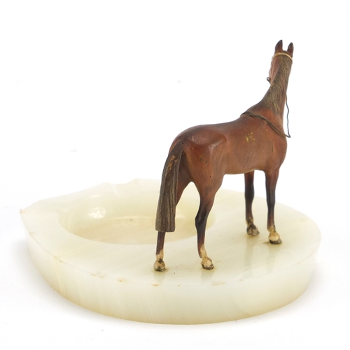 13 - Cold painted bronze and onyx horse design ashtray, 10cm high