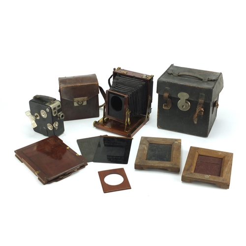 108 - 19th century mahogany plate camera by Thornton Pickard with leather case, and a Cine Nizo 8 camera