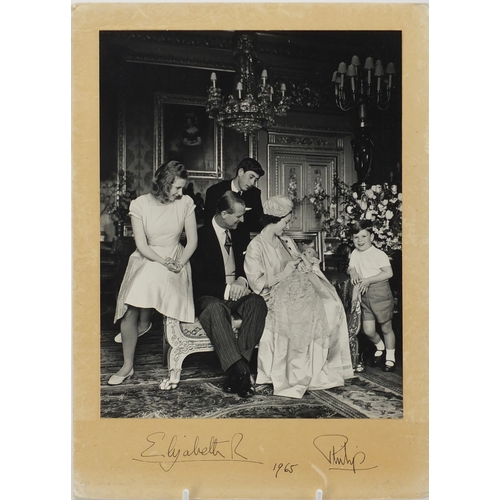 119 - Royal ephemera including a black and white photograph signed by Queen Elizabeth II and Prince Philip... 