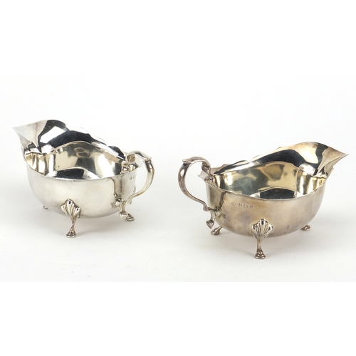 590 - Pair of silver three footed sauce boats, by Adie Brothers Ltd, Birmingham 1909-11, each 15.5cm in le... 