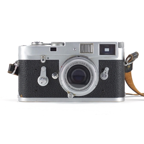 99 - Leica M2 Rangefinder Camera with Elmar lens and leather case, the camera serial number 1103653