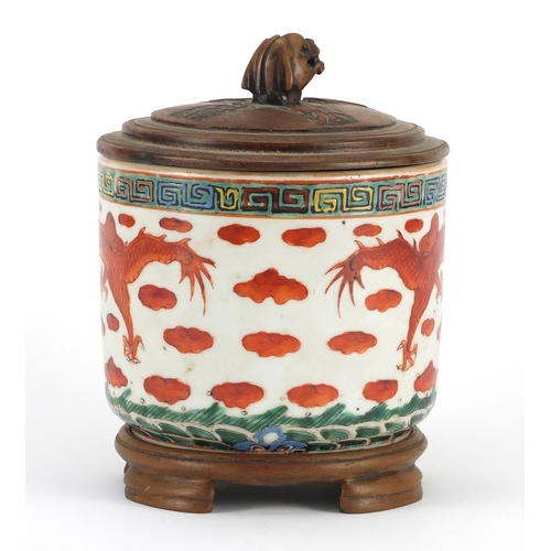 283 - Chinese porcelain iron red brush pot with carved hardwood cover on hardwood stand, hand painted with... 