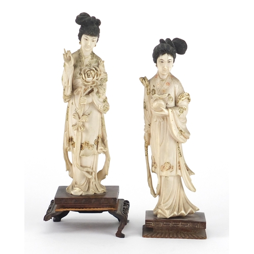 350 - Pair of Japanese part stained carved ivory okimono's of Geisha girls, each raised on carved hardwood... 