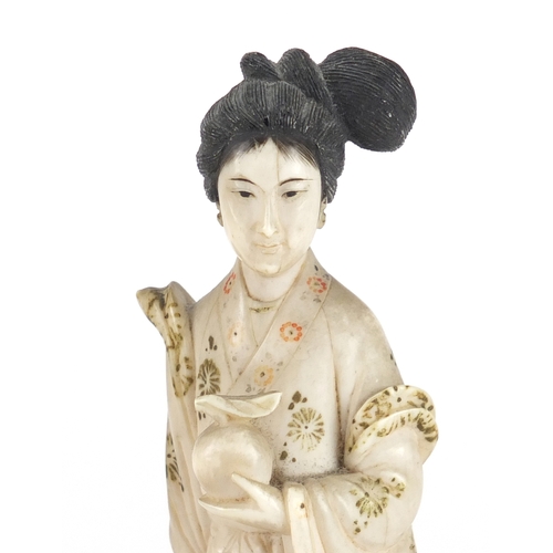 350 - Pair of Japanese part stained carved ivory okimono's of Geisha girls, each raised on carved hardwood... 