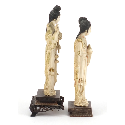 350 - Pair of Japanese part stained carved ivory okimono's of Geisha girls, each raised on carved hardwood... 