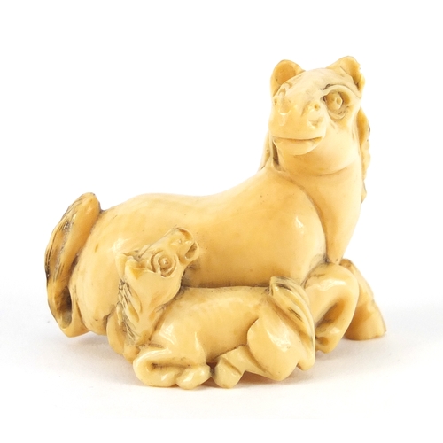 355 - Japanese carved ivory Netsuke of a horse and foal, incised marks to the underside, 4.2cm wide