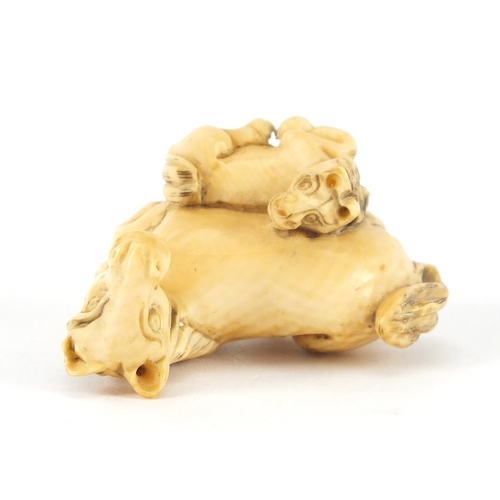 355 - Japanese carved ivory Netsuke of a horse and foal, incised marks to the underside, 4.2cm wide