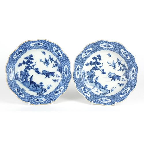 266 - Pair of 18th century Chinese blue and white porcelain shallow dishes, each hand painted with deer an... 