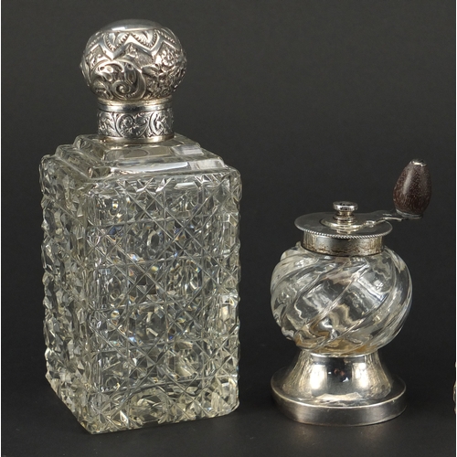 599 - Victorian silver mounted glass salt grinder and pair of Victorian cut glass bottles with silver lids... 