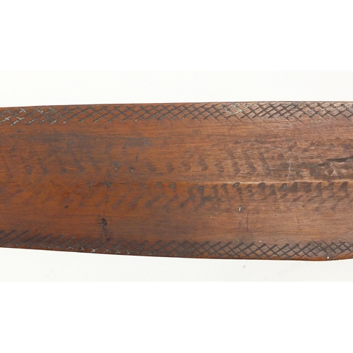 371 - Andaman Islands wood bow of double paddle form, with incised decoration, 197cm in length