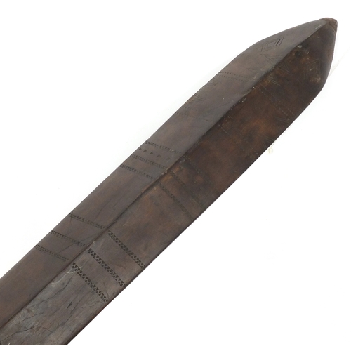 373 - Oceanic hardwood war club probably Samoan, the tapering blade with incised decoration, 128cm in leng... 