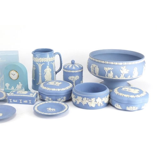 2326 - Predominantly Wedgwood Jasperware including a pedestal bowl, mantel clock with box and vases, the la... 