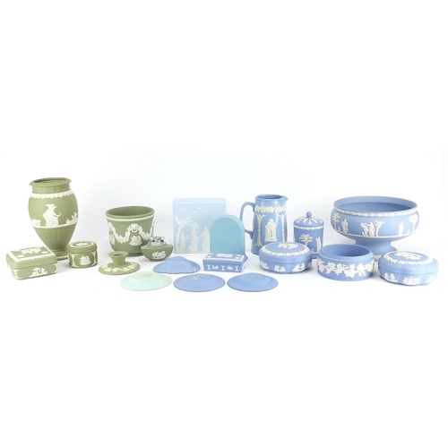 2326 - Predominantly Wedgwood Jasperware including a pedestal bowl, mantel clock with box and vases, the la... 