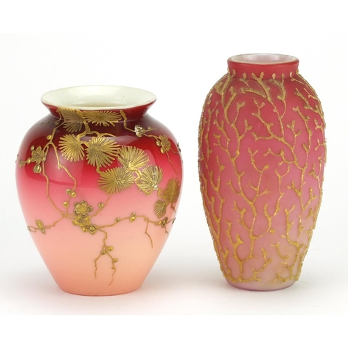 2192 - Two 19th century satin glass vases including one gilded with blossoming trees, the largest 13.5cm hi... 
