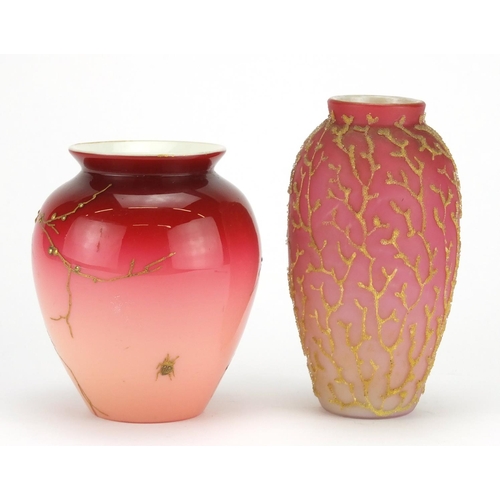 2192 - Two 19th century satin glass vases including one gilded with blossoming trees, the largest 13.5cm hi... 