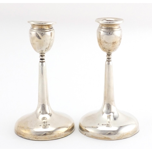 2581 - Pair of Arts & Crafts silver candlesticks of tapering form, by Charles S Green & Co Ltd, Birmingham ... 