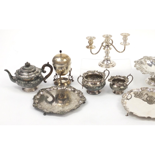 2164 - Silver plate including a three piece tea service, pair of three branch candelabras, an egg warmer wi... 