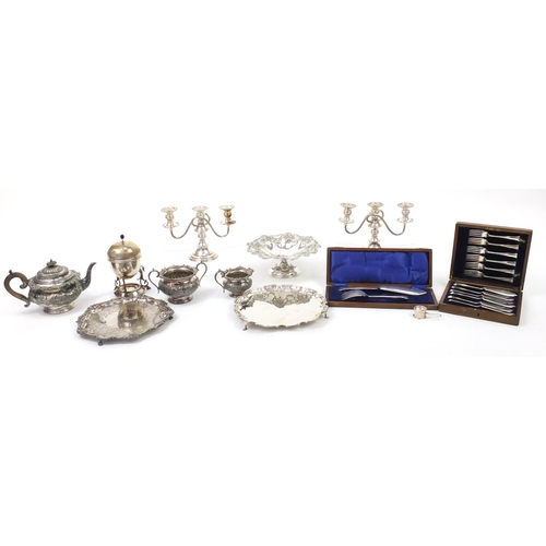 2164 - Silver plate including a three piece tea service, pair of three branch candelabras, an egg warmer wi... 