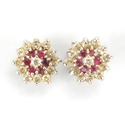 2867 - Pair of 9ct gold pink and clear stone flower head earrings, 7mm in diameter, approximate weight 1.1g