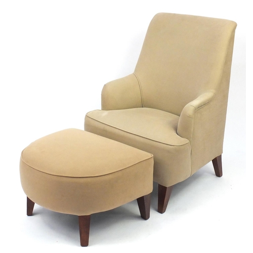 2055 - Contemporary beige high back open armchair with stool on square tapering legs, 103cm high