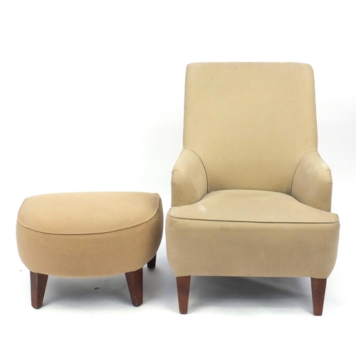 2055 - Contemporary beige high back open armchair with stool on square tapering legs, 103cm high