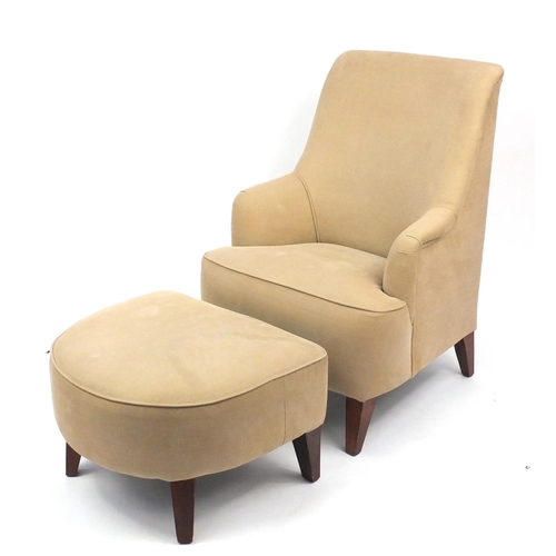 2056 - Contemporary beige high back open armchair with stool on square tapering legs, 103cm high