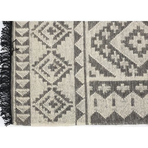 2069 - Rectangular John Lewis grey handmade wool rug, 180cm x 120cm