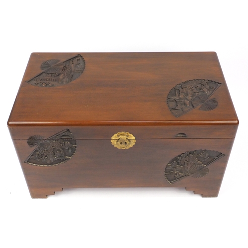 2046 - Chinese camphor wood blanket box, carved with figures and landscapes in fan cartouches, the interior... 