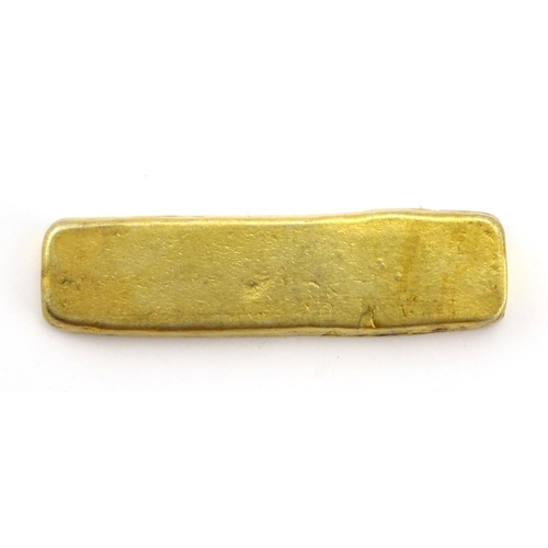 2315 - Chinese gilt metal scroll weight, 8cm in wide, approximate weight 77.5g