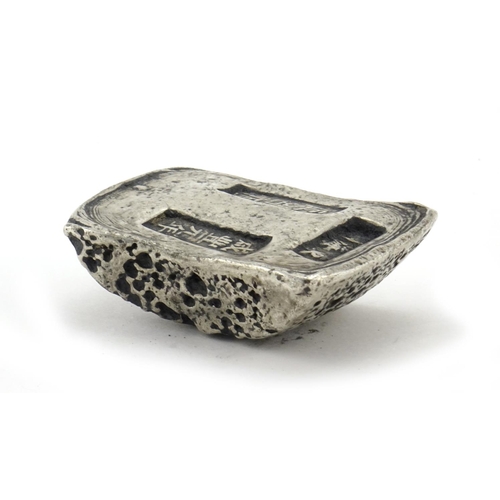 2313 - Chinese silver coloured metal scroll weight, 3.7cm wide, approximate weight 201.7g