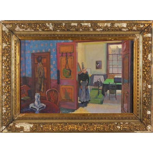 194 - Female in an interior, oil on canvas board, bearing a signature Wolmark and inscription verso, mount... 