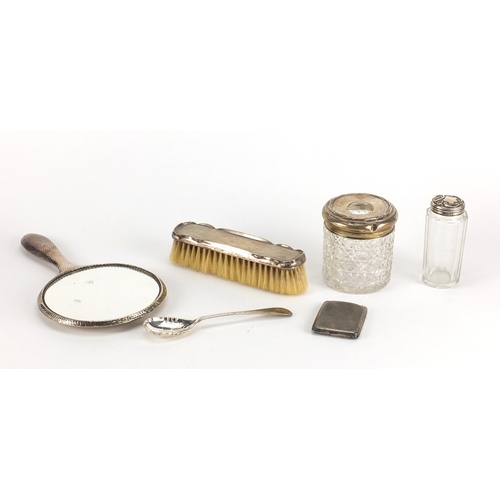 2595 - Silver vanity items including a hand mirror, cut glass tissue jar and a vesta, various hallmarks, th... 