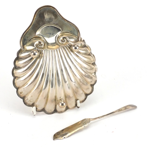 2598 - Silver shell shaped butter dish and knife, by James Deakin & Sons, Sheffield 1911, housed in a fitte... 