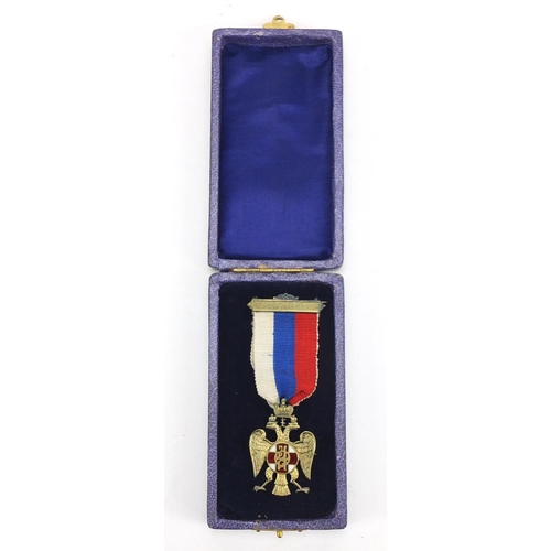 762 - Russian silver and enamel double head eagle medal with ribbon and box, 8cm in length