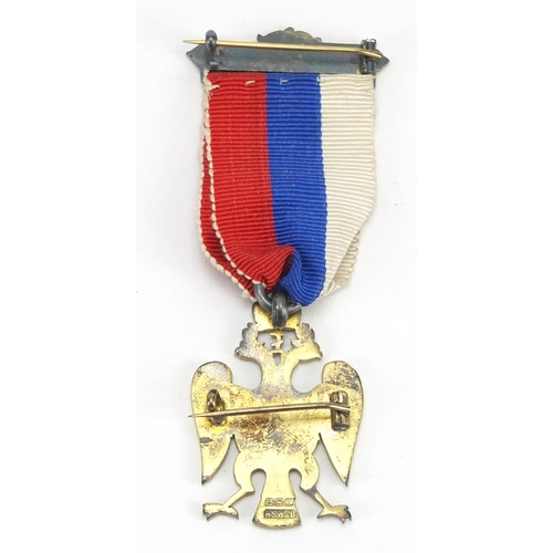 762 - Russian silver and enamel double head eagle medal with ribbon and box, 8cm in length
