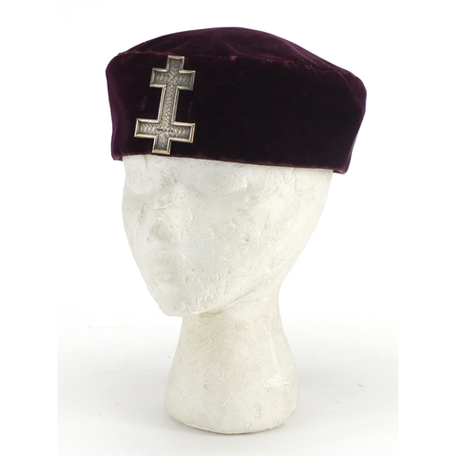 638 - Masonic interest purple cloth hat with silver badge, London hallmarked
