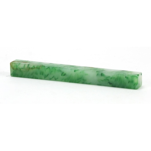 433 - Chinese mottled green stone scroll weight, 17cm in length