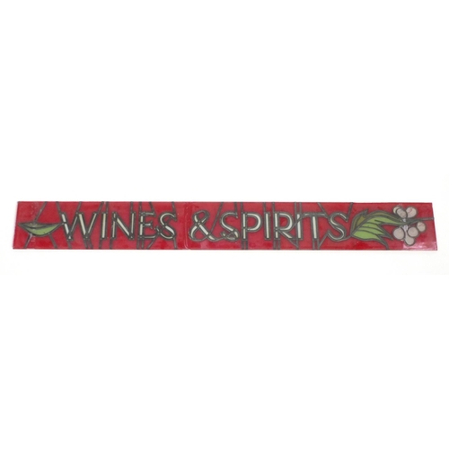 55 - Hand painted glass bar advertising sign with leaded decoration, wines and spirits, 132cm x 15.5cm