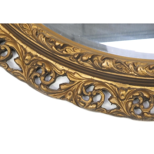 20 - Large oval gilt framed mirror, with bevelled glass, 97cm x 83cm