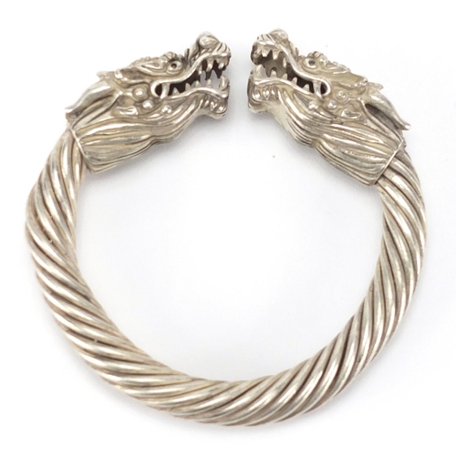 349 - Chinese silver coloured metal dragon bangle, 9cm in diameter, approximate weight 122.0g
