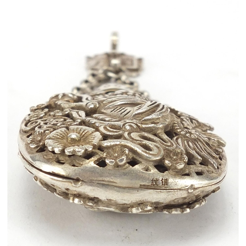 649 - Chinese silver coloured metal chatelaine snuff bottle, decorated with Foo Dogs, 15cm in length, appr... 