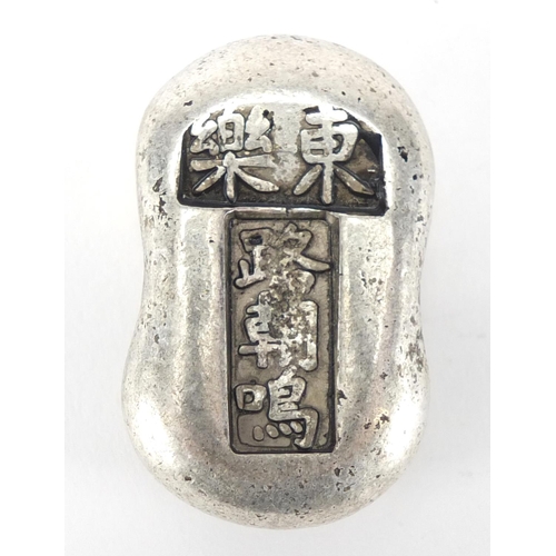 671 - Chinese silver coloured metal scroll weight, 4cm wide, approximate weight 61.5g