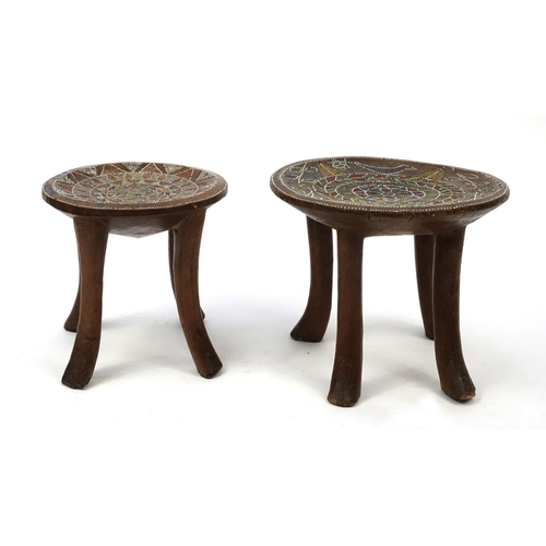 49A - Two African beadwork four stools, the larger decorated with birds, flowers and geometric motifs, the... 