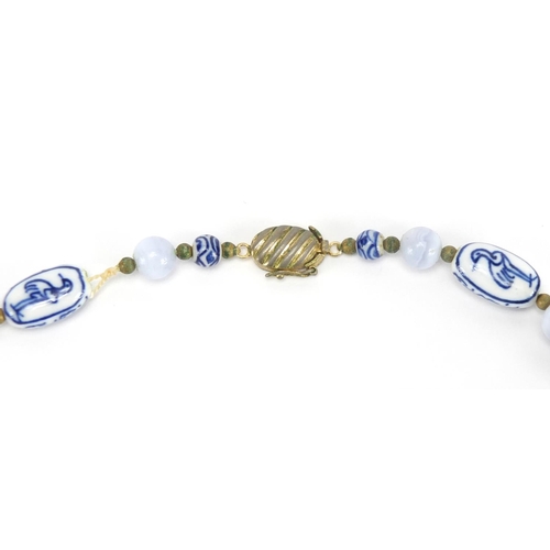 432 - Chinese blue and white porcelain bead necklace, 64cm in length