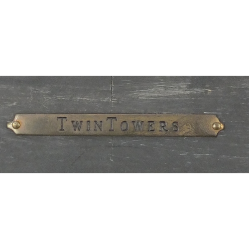 2101a - David Burt 2002 - Twin Towers, relief bronze plaque, framed, 51cm x 35cm